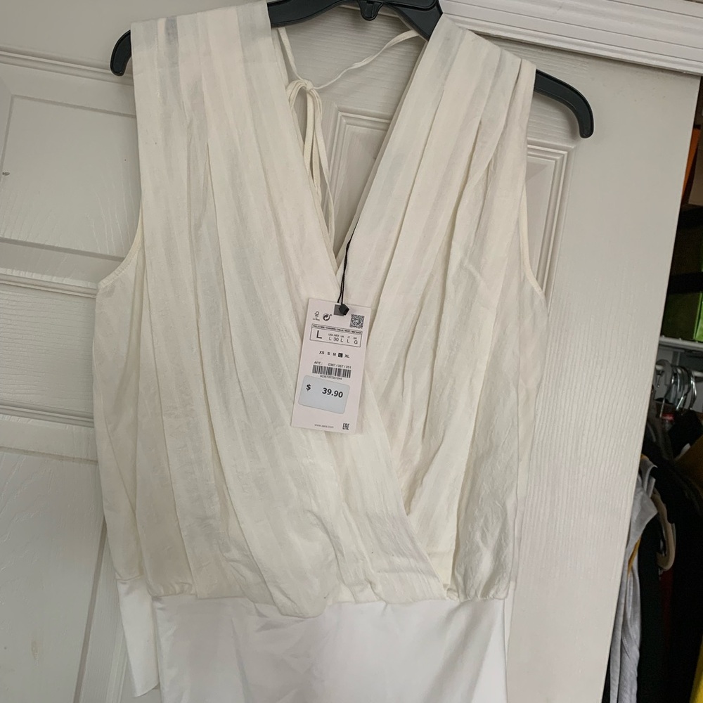 Elegant White Sleeveless Blouse